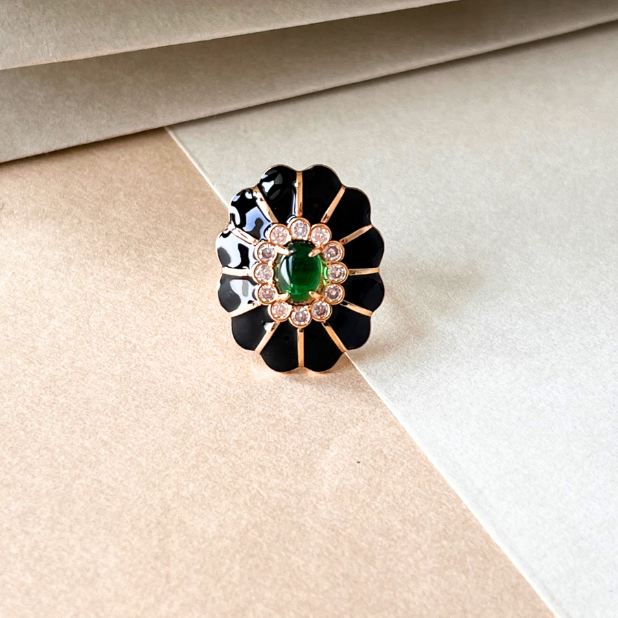 One elegant earrings with black and green hues, adorned with sparkling diamonds for a touch of glamour.