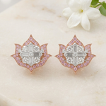 Lotus No. 04 Blush Studs in rose gold with pink sapphires on marble surface