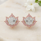 Lotus No. 04 Blush Studs in rose gold with pink sapphires on marble surface