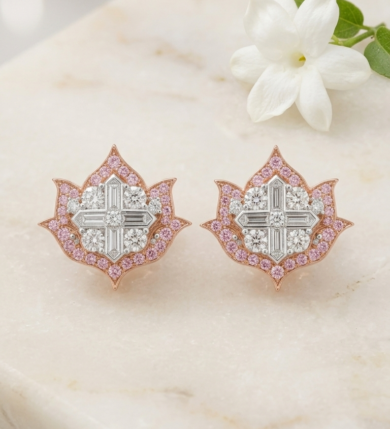 Lotus No. 04 Blush Studs in rose gold with pink sapphires on marble surface